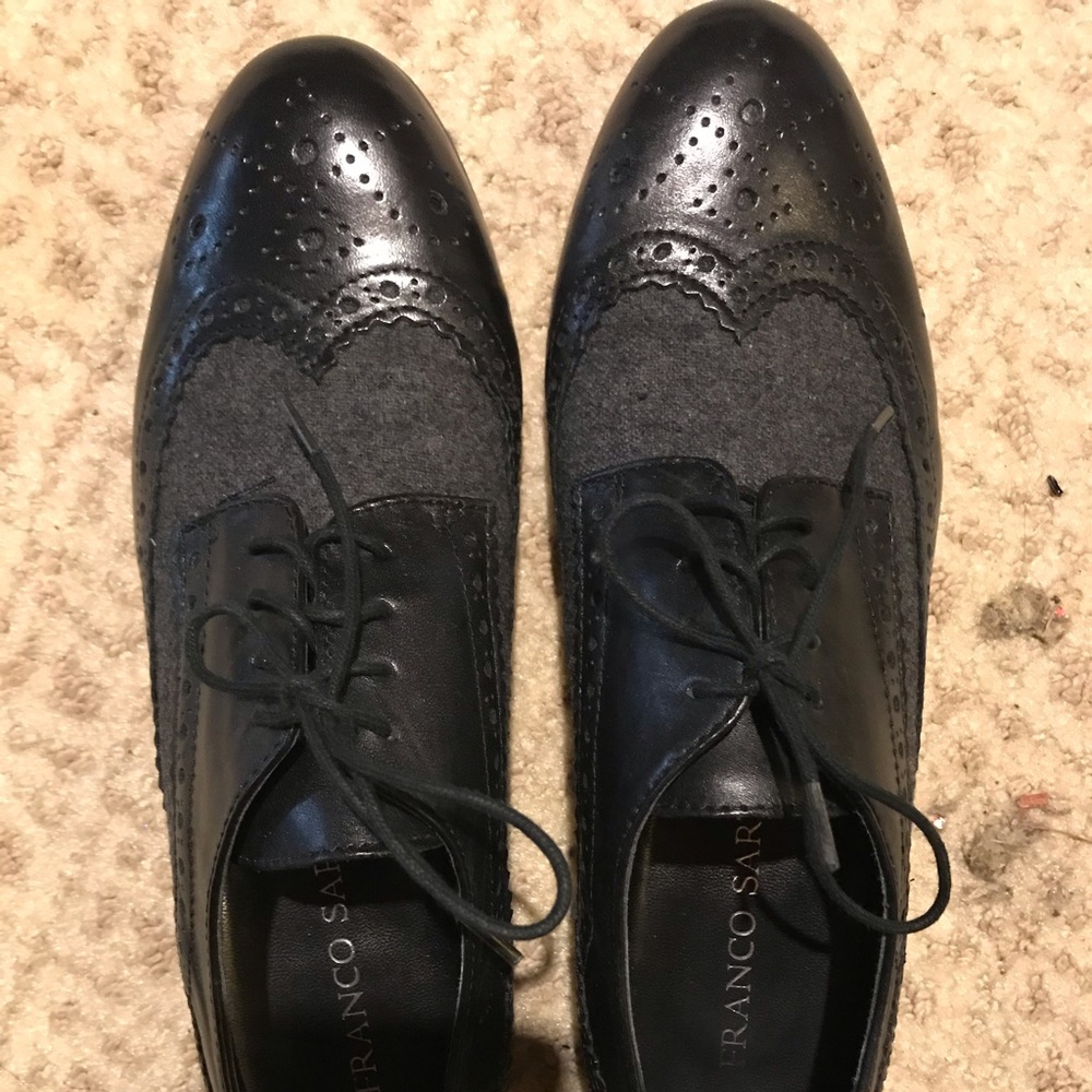 Grey and black brogues